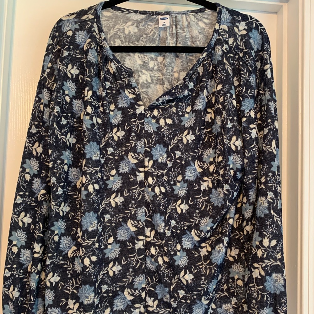 Long sleeve flower shirt.